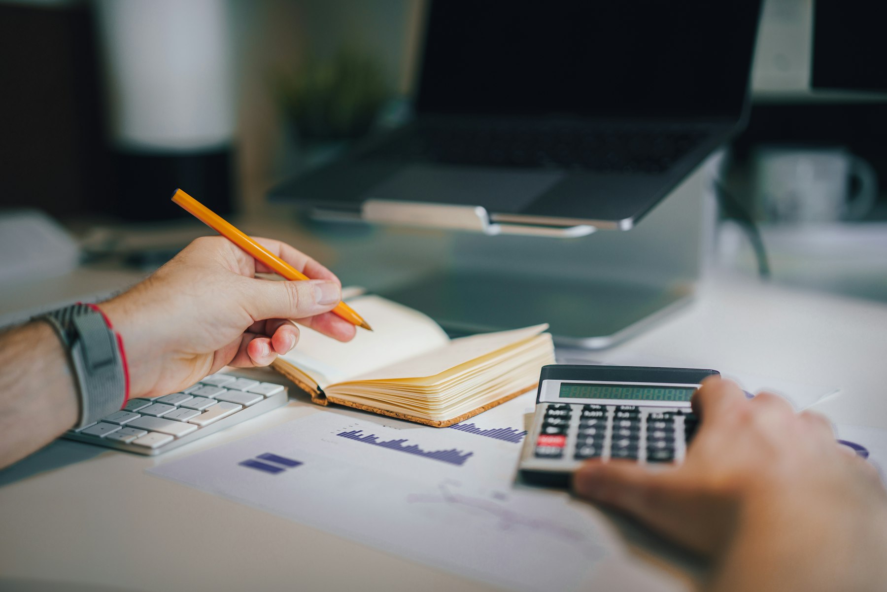 Calculator and paperwork on a desk