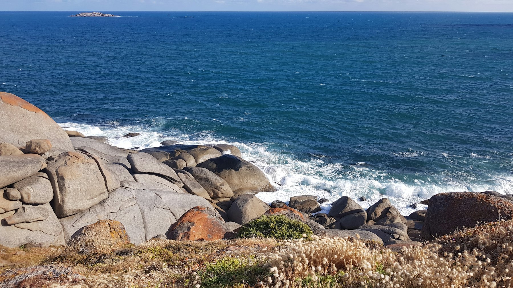 Rocky shoreline with clear water