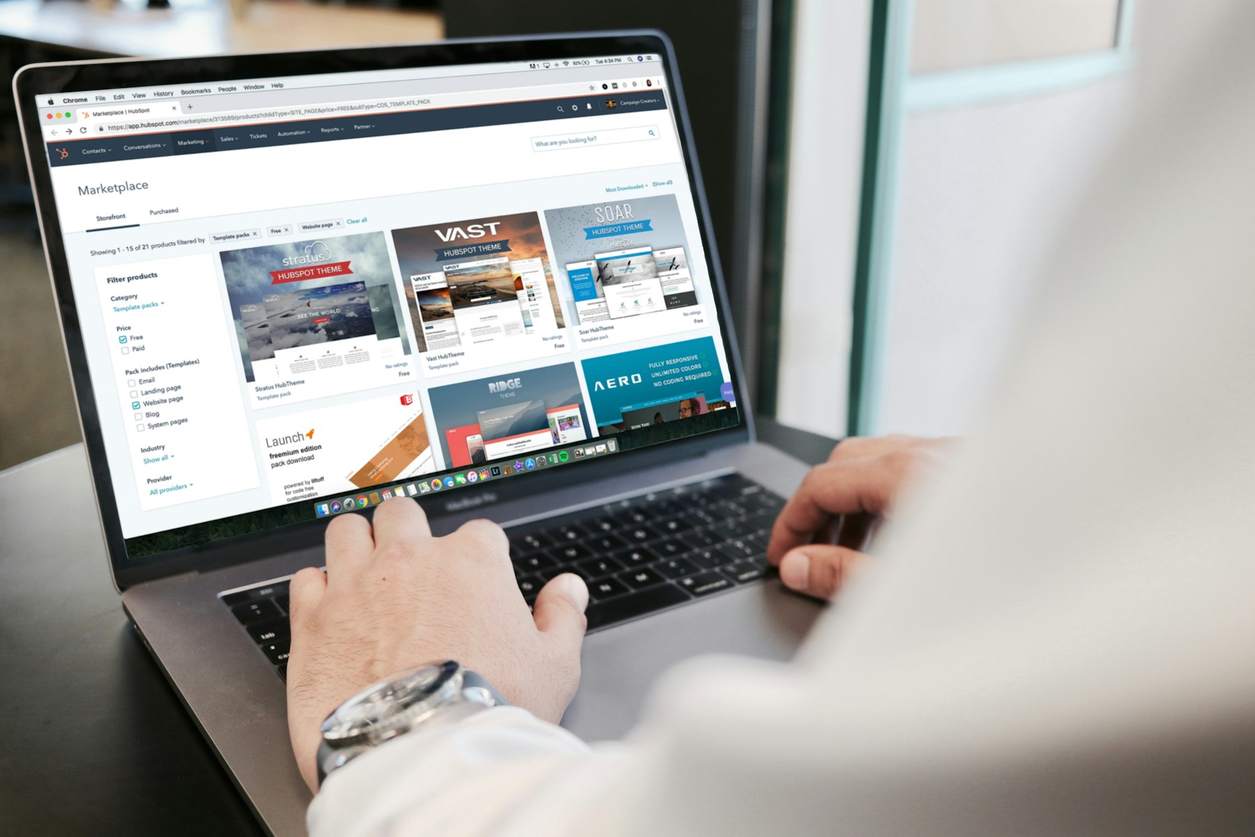 Business owner checking a new website on a laptop