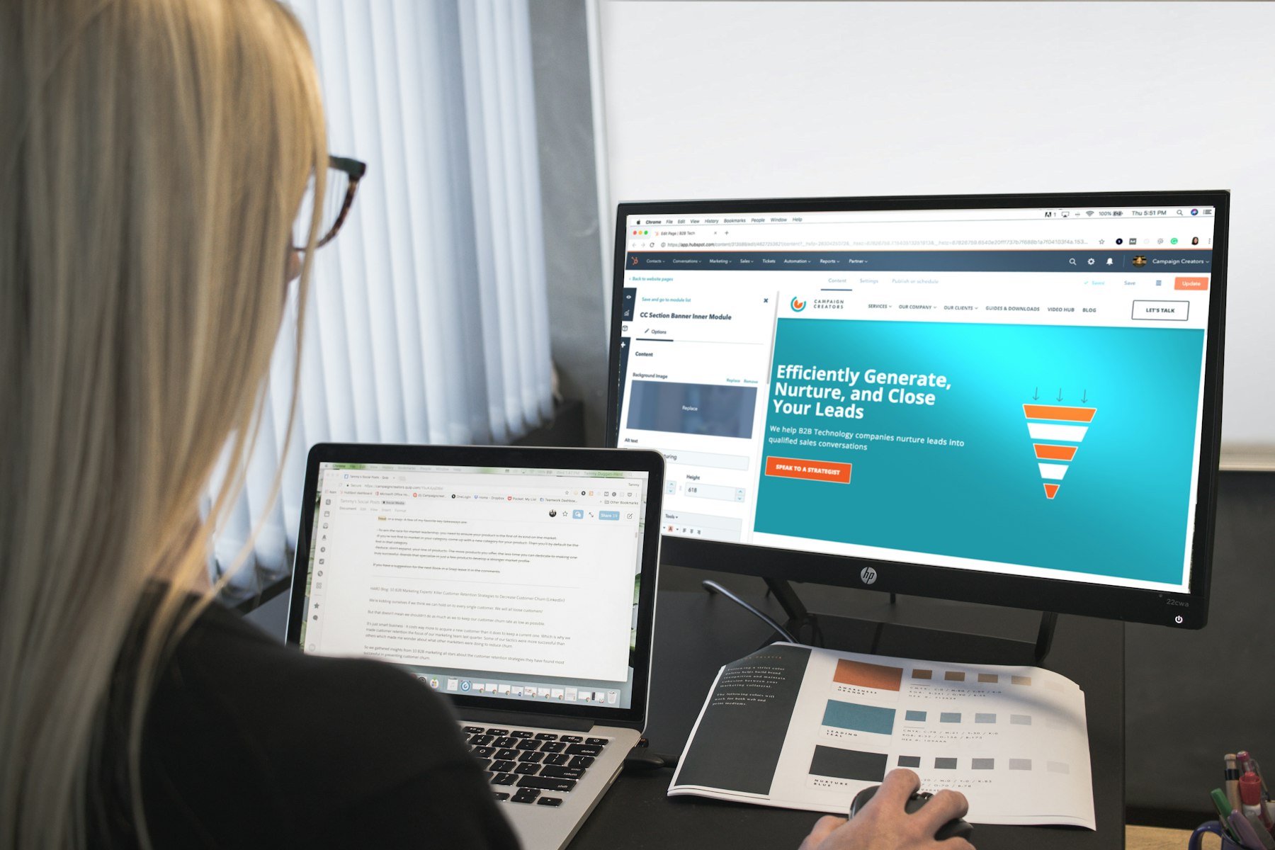 Business owner editing her own website on a monitor